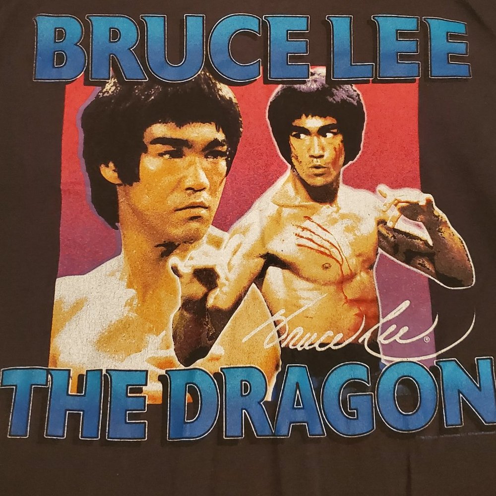 Bruce Lee of navy tee. Discontinued size M men's